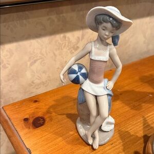 Laden Beach Girl Figurine in White, Blue and Pink - Decorative Home Art